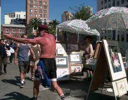 What is this guy doing. Note - I don't think he's cute :)