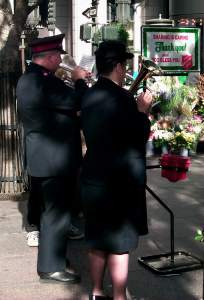 The Salvation Army tries to convince us it's Christmas, despite the warm weather