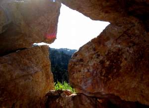 An attempt at an arty pic through a tiny hole in a mini stone wall.