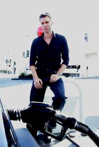 Pumping gas en route to the airport. The obliterating white light is from a nearby nuclear explosion. No biggy.