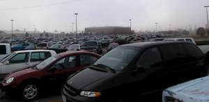 Arriving at our customer's site on a foggy morning. All these cars belong to people who work
 in that building on the horizon!