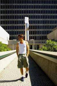 Strolling across one of the walkways leading to the Embarcadero Center, adopting my
patented "I don't know I'm being photographed" pose.