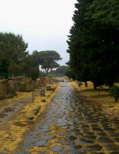 Last view down the rain spattered main street of Rome's ancient sea port