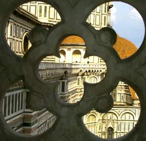 A view of the Duomo through stone-work in the Campanille