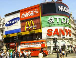 Passing through Picadilly Circus, brilliant in the sunshine.