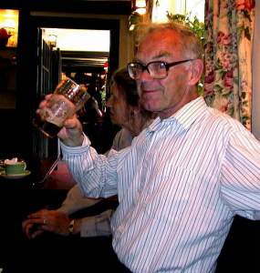 Dad doing something at which he's quite accomplished - knocking back a pint.