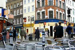 People watching from the Stock Pot on Old Compton Street