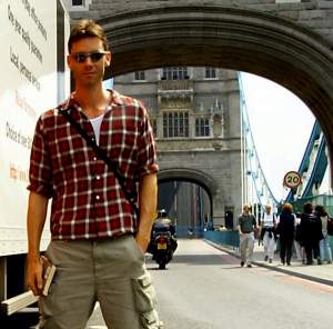 I was just about to cross the bridge, when its central span was drawn up to let a ship
through. See how the road in the center of the archway is vertical?
