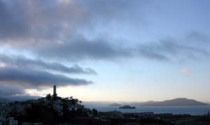 The fog rolls in after sunset last night, just about ready to obscure the bay.