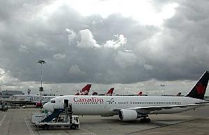 Uh oh, threatening (but beautiful) clouds, as we taxi into Heathrow