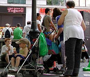 Big mix in Leicester Square. Note the Italian youth dead center in the background,
wearing a t-shirt and underpants. His friend was dressed
similarly.