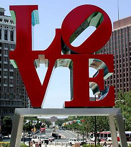 The Love sculpture, with the Philadelphia Museum of Art in the distant background.
