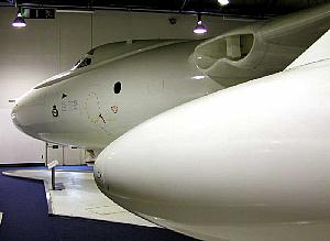 A Vanguard bomber, a large, beautiful plane painted all white, from the second-half of the 20th century.