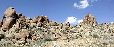 Tiny John-Paul lost in a boulder park