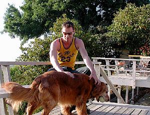 At B & S's new house, on the deck overlooking Los Angeles, playing with yet another dog