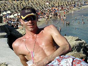 At the Coco Bar, above Superparadise Beach, looking very happy after consuming most of my Pina Colada